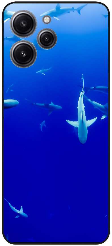 group of sharks under body of water