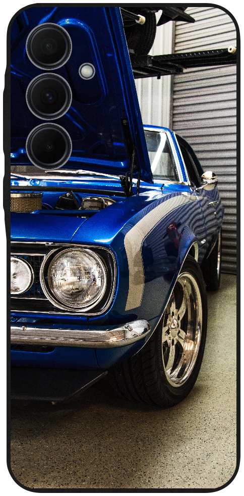 blue muscle car with open hood near roller shutter
