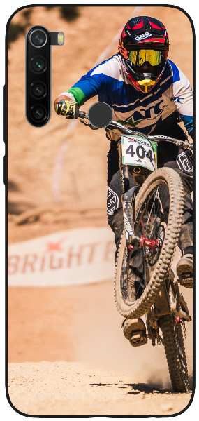 Man riding motocross on motocross track