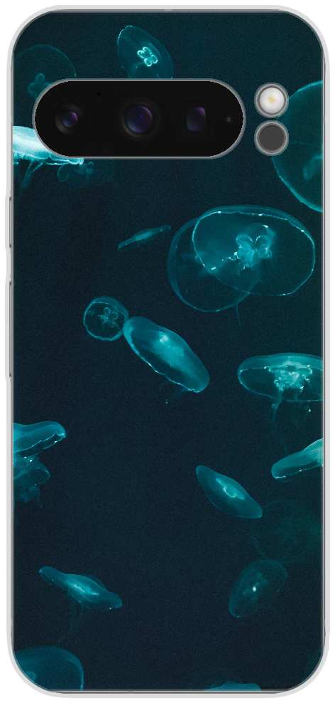Blue and white jellyfish in water