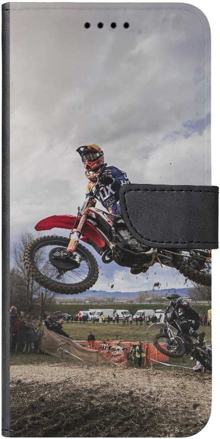 man riding red motocross dirt bike
